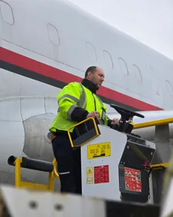 Ground handling crew member working on the tarmac